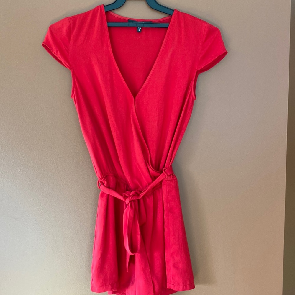Dynamite ladies romper in gorgeous red color. Size extra small.